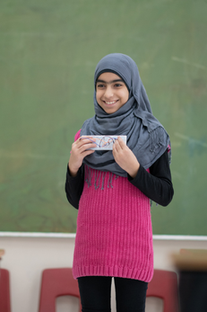girl giving a presentation to her class