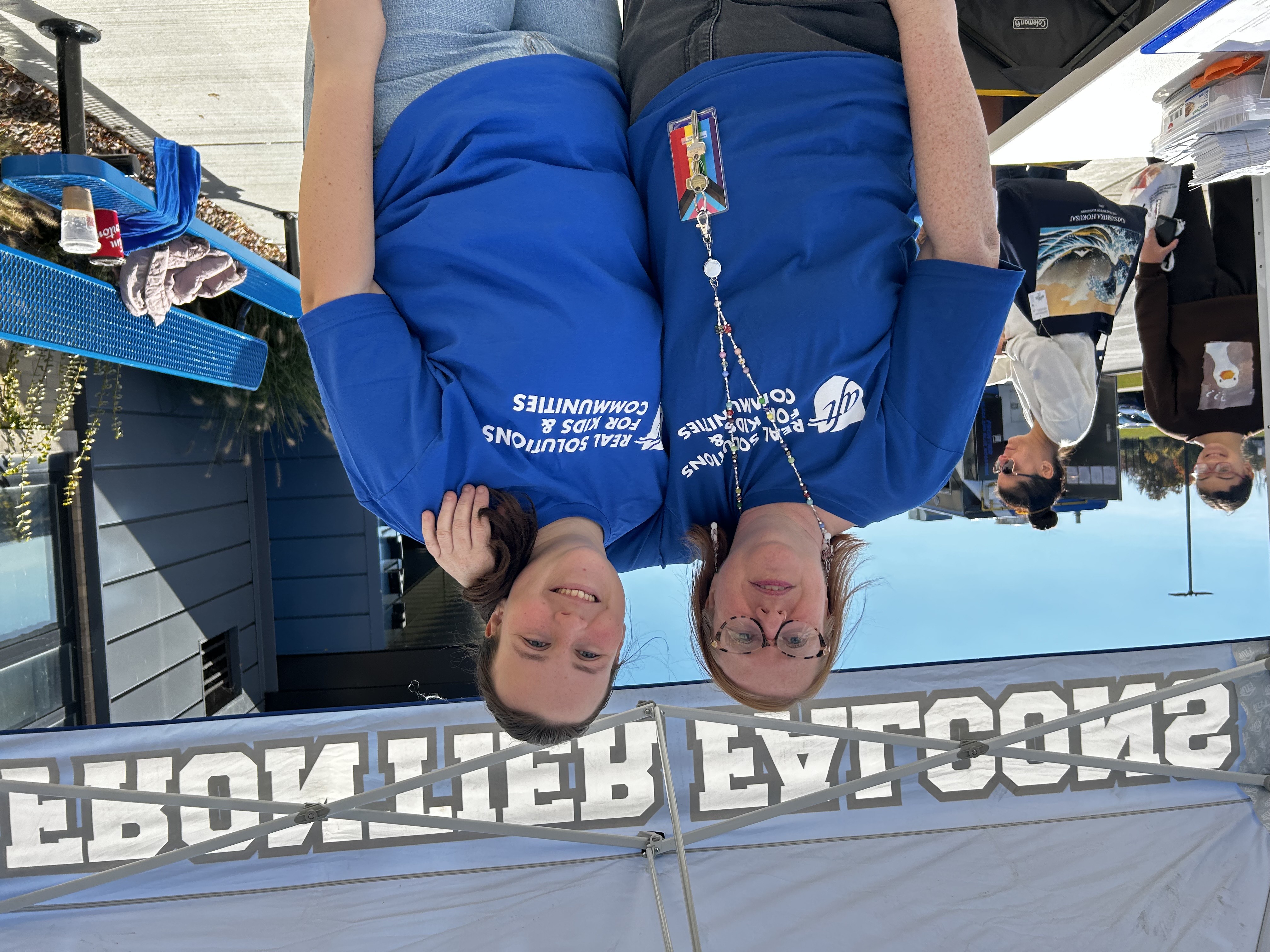 Amber Chandler and her daughter at the Reading Opens the World Event