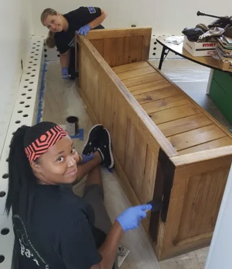 Students Olivia Burrison (front) and Andrea Bliss at work.