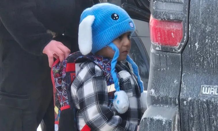 An ICE agent detains Valley View Elementary student Liam Conejo Ramos on January 20, 2026, in a photo provided by Columbia Heights school officials and credited to Ali Daniels.